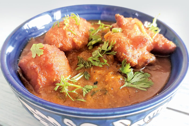 Boror Tenga (Lentil Fritters in a Sour Gravy)